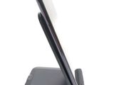 a cell phone that is sitting on top of a stand