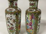 pair of antique chinese vases with asian scenes on them
