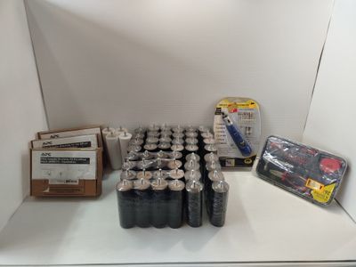 many cans of soda sitting on a shelf in the corner of a room