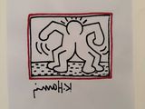 drawing of a couple of elephants on a piece of paper with a red border
