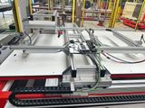 an image of a machine that is sitting on a table in a factory