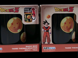 boxes of dragon ball mugs on display in a store