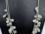 a close up of a necklace on a mannequin mannequin