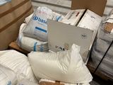 a large amount of bags and boxes in a warehouse
