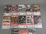 a lot of video games that are on the table