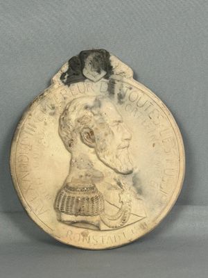 une image représentant une pièce de monnaie sur laquelle figure le portrait d'une femme