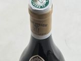 a bottle of coffee that is sitting on a table