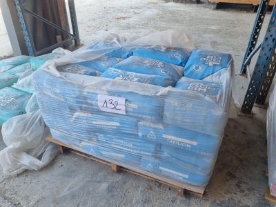 a pallet full of bags of water sitting on a pallet