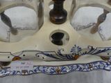 a candle holder that has two candles inside of it