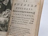 an open book with a picture of a woman in a bed