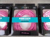 three packages of pink and black cables in a package