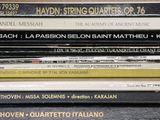 a stack of music cds stacked on top of each other