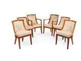 ensemble composé de six chaises à accoudoirs et d'une table placée au milieu