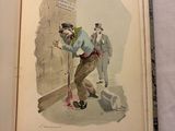an open book with a picture of a man and a dog