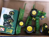 a box with a toy tractor and a box with a toy tractor in it