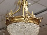 a chandelier hanging from the ceiling in a room