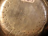 a close up of a clock on a table