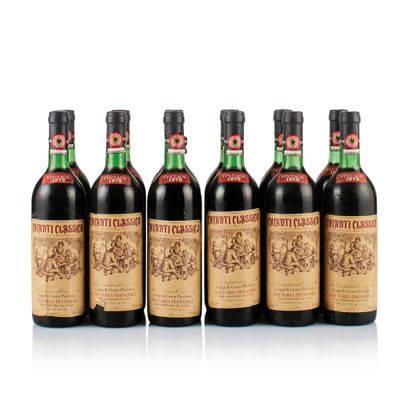 four bottles of wine are lined up in a row