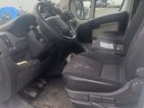 a picture of the inside of a van with the driver ' s seat down