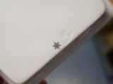 a person holding a white box with a star on it