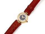 an image of a close up of a wrist watch on a white surface