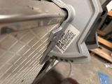 a close up of a metal object with a sticker on it