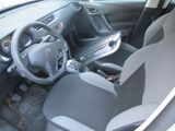 the interior of a car with a steering wheel and a dashboard