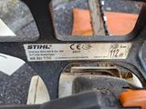 an image of a close up of a chain saw
