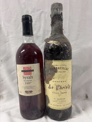 two bottles of wine sitting next to each other on a table