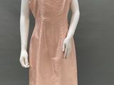 an image of a mannequin wearing a pink dress on a mannequin mannequin