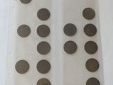 a lot of coins that are on the table