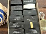 a box of soaps sitting on a table next to a bag of soap