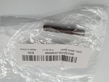 a close up of a screw in a plastic bag on a table