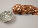 a small bowl and a small bowl on a table