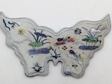 a picture of a butterfly that is painted on the wall