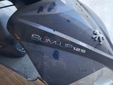 a close up of a motorcycle with the sun air logo on it