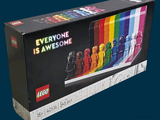 a box of legos that has a rainbow of colors on it