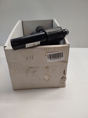 two pens in a box on a white table