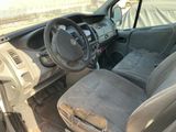 dashboard of a car with a dirty seat and steering wheel