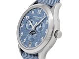 a close up of a watch on a white background with a blue strap