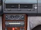 a car dashboard with a radio and other electronic controls