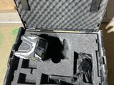 a case that has a camera and other items in it