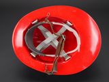 a red hard hat with a no entry sign on it