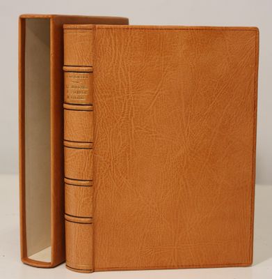 a brown leather book with three pages open on a white surface