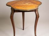 an image of a small table with a wooden top on a white background