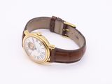 wrist watch with brown leather strap on white background