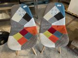 two chairs that are made out of patchwork fabric