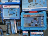 many different types of tools on the shelf