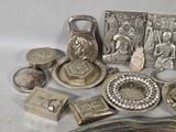 a lot of silver items that are on a table