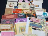 many cards and envelopes laid out on a table